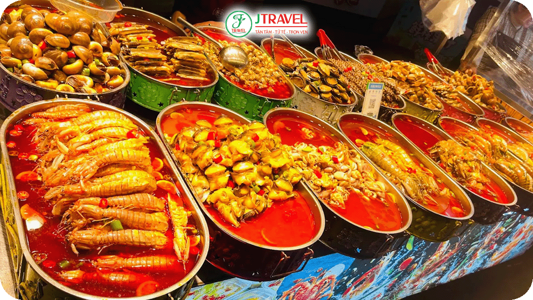 Hải sản ngâm cay nổi tiếng ở chợ đêm Song Kiều Côn Minh