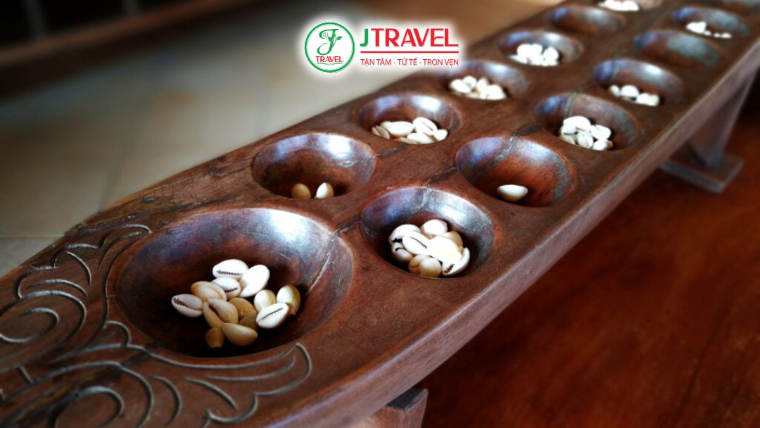 Trò chơi dân gian Sungka bằng gỗ với các hạt đá nhỏ